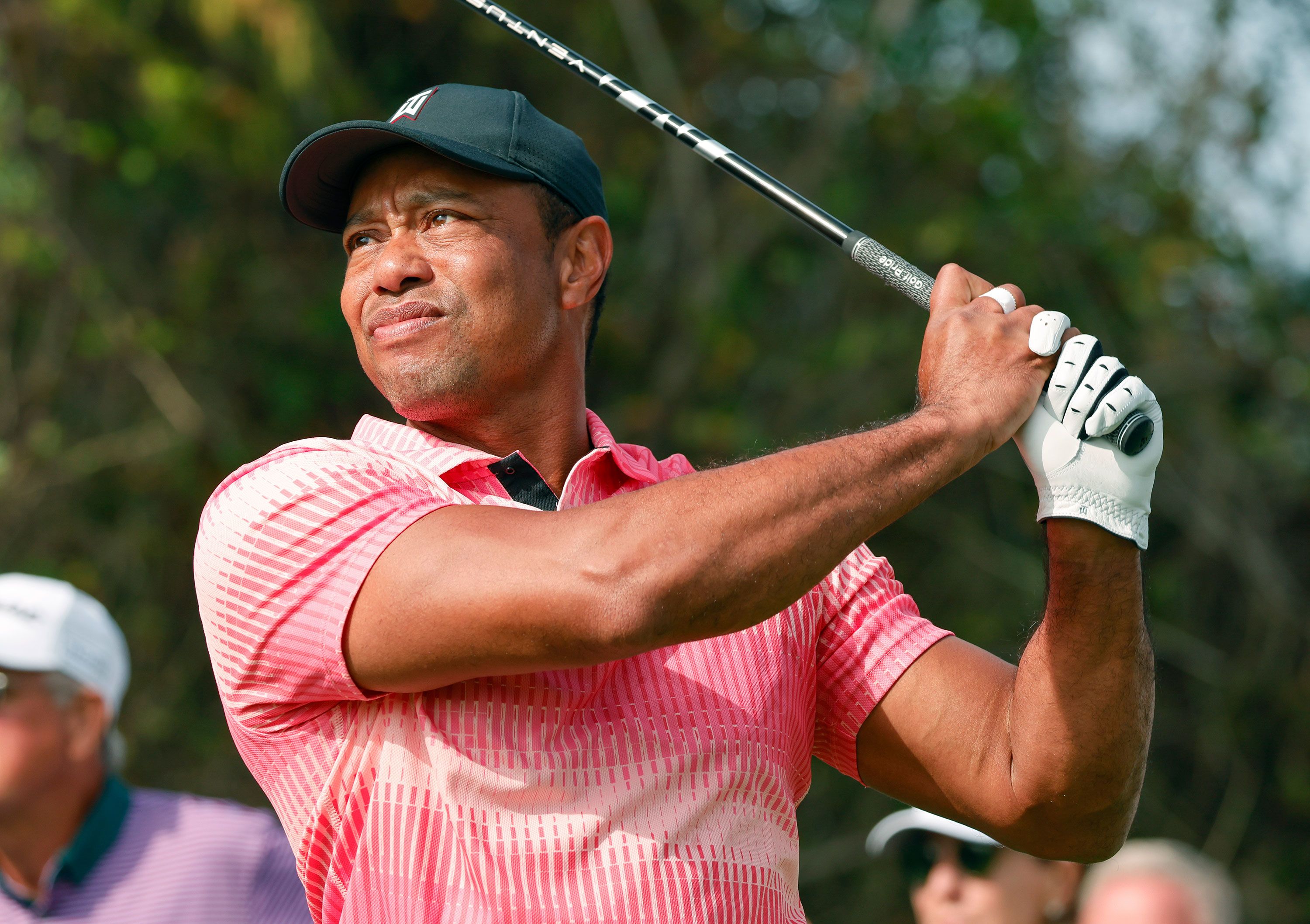 Dec 17, 2022; Orlando, Florida, USA; Tiger Woods hits his drive on the first tee during the first round of the PNC Championship golf tournament at Ritz Carlton Golf Club Grande Lakes Orlando Course. Mandatory Credit: Reinhold Matay-USA TODAY Sports