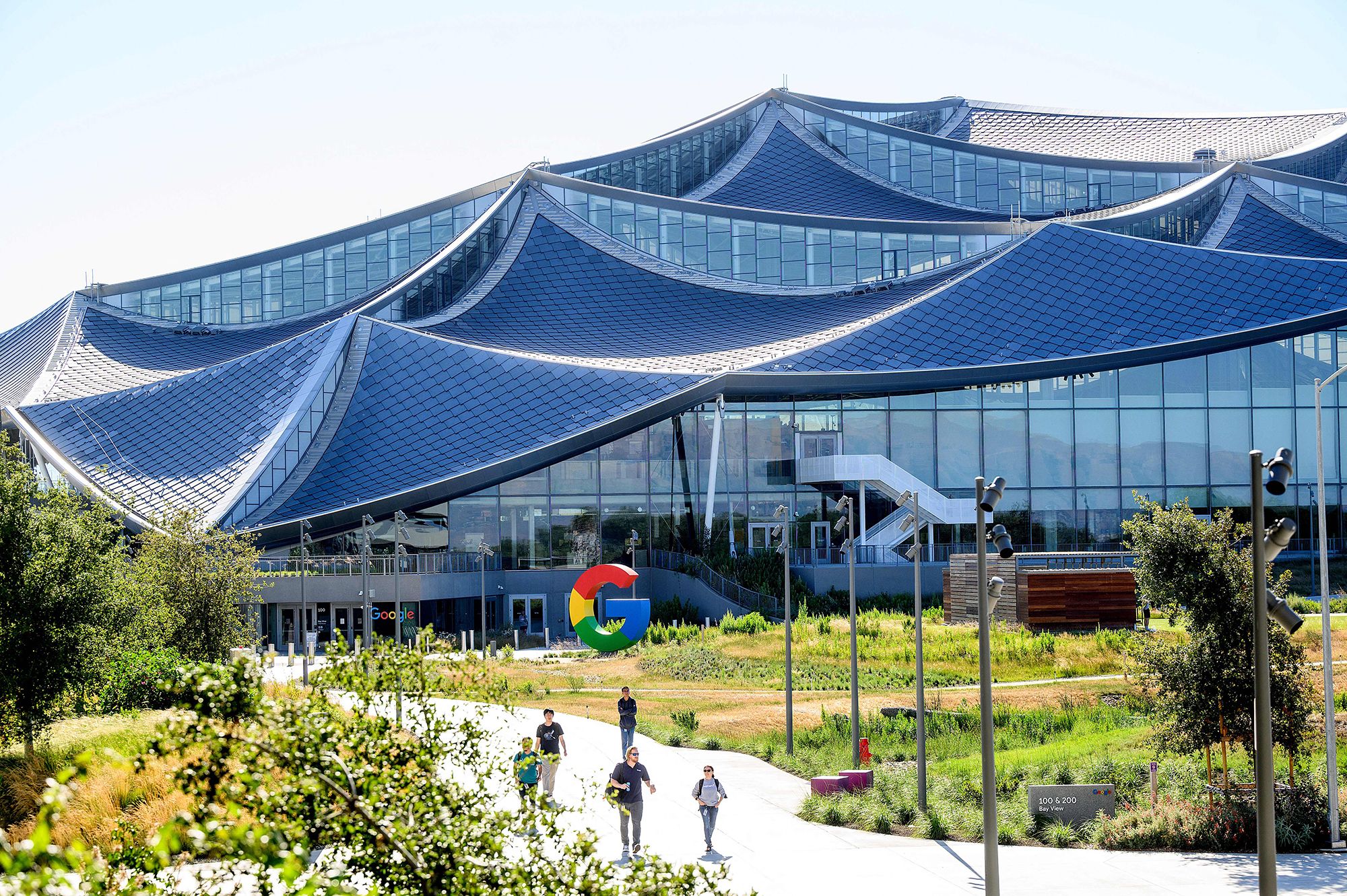 Workers leave Googles Bay View campus in Mountain View, California on June 27, 2022. 