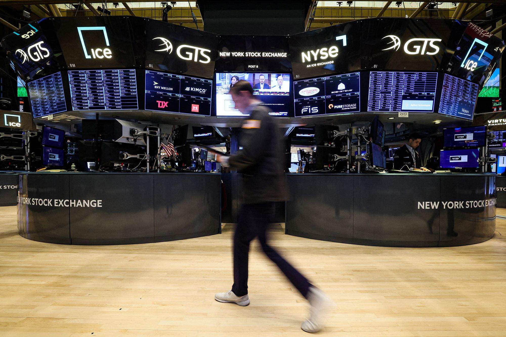 Traders work on the floor of the New York Stock Exchange (NYSE) in New York City, U.S., March 28, 2023.