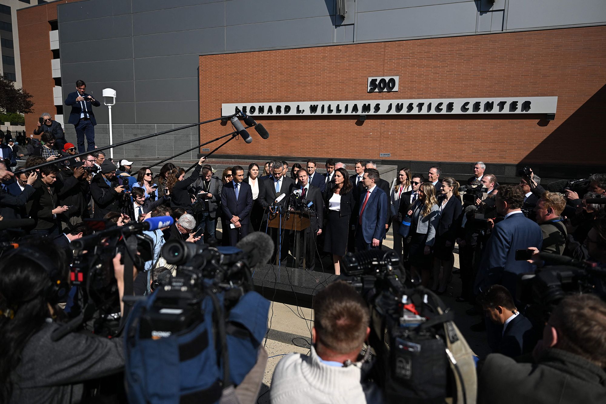 Justin Nelson, joined by fellow members of the Dominion Voting Systems legal team, speaks to members of the media outside the Leonard Williams Justice Center in Wilmington, Delaware, on April 18, 2023. - Vote machine maker Dominion and Fox News settled a defamation case over falsehoods about the 2020 presidential election aired on the conservative TV network, a US judge announced Tuesday. 